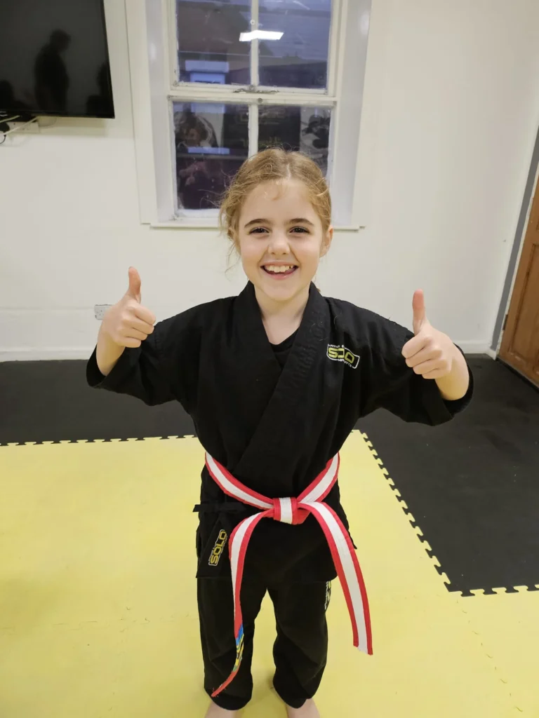 7-9 year old Girl in a SOLO Martial Arts Karate Suit